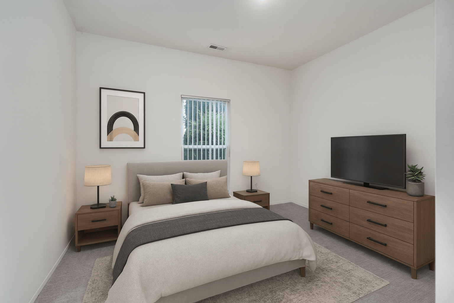 A bedroom with a bed, nightstands, and a television.